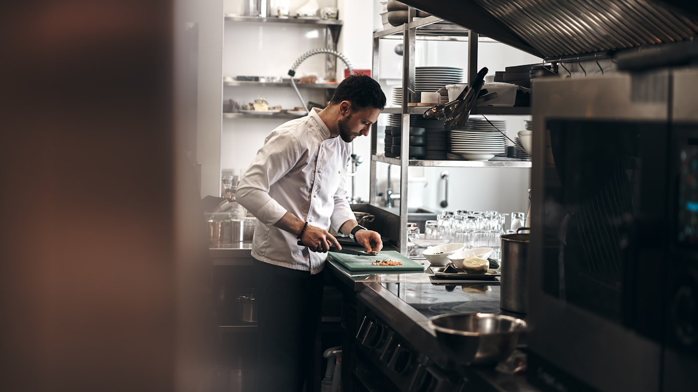 Chef Keren Biton preparing a dish